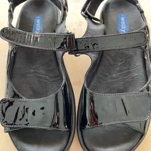 Wolky black patent leather sandal size 37 in like new condition.
